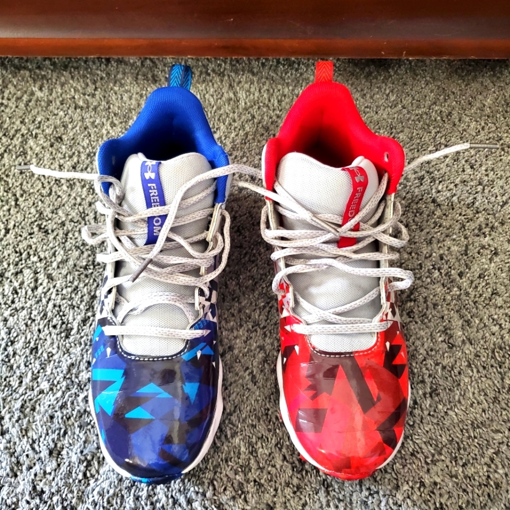 Under Armour football cleats, Youth Size 5.5, like new, only worn inside.